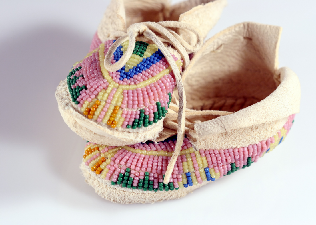 A pair of Indigenous beaded moccasins.
