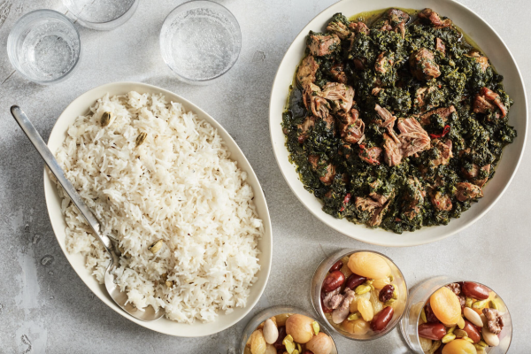 Table laden with dishes traditional for Nowruz.