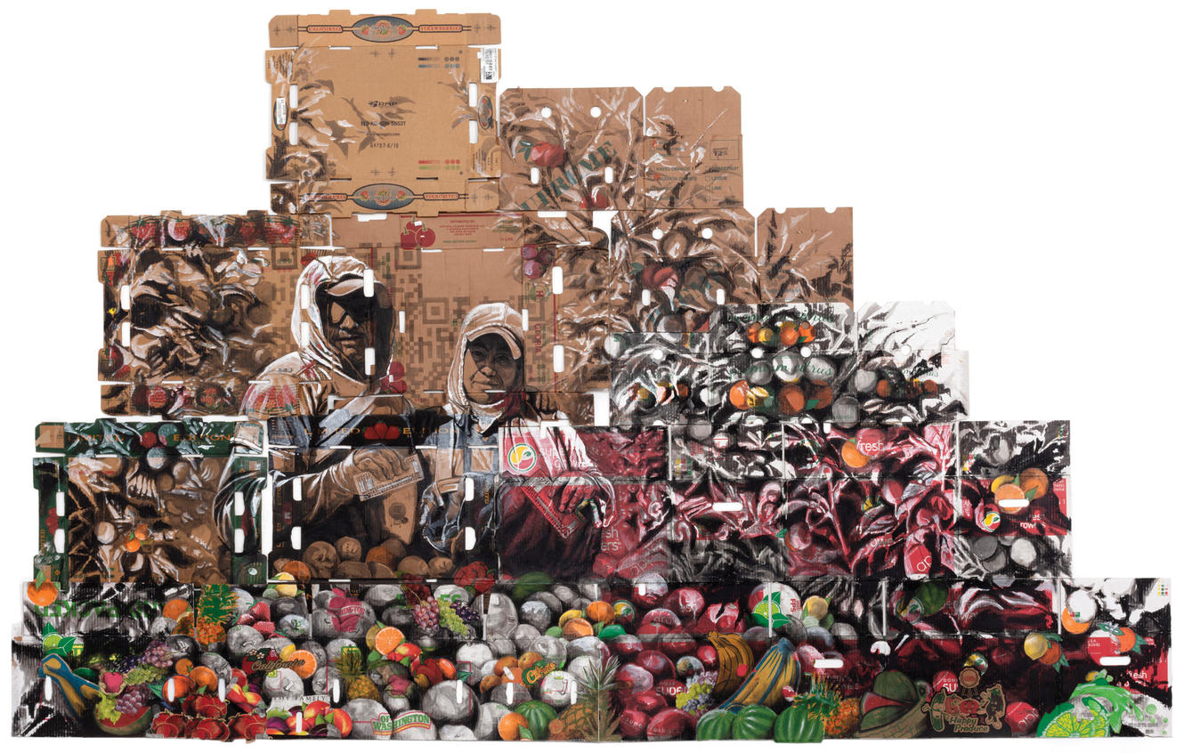 Artwork on cardboard boxes of two farmworkers standing with piles of produce surrounding them.